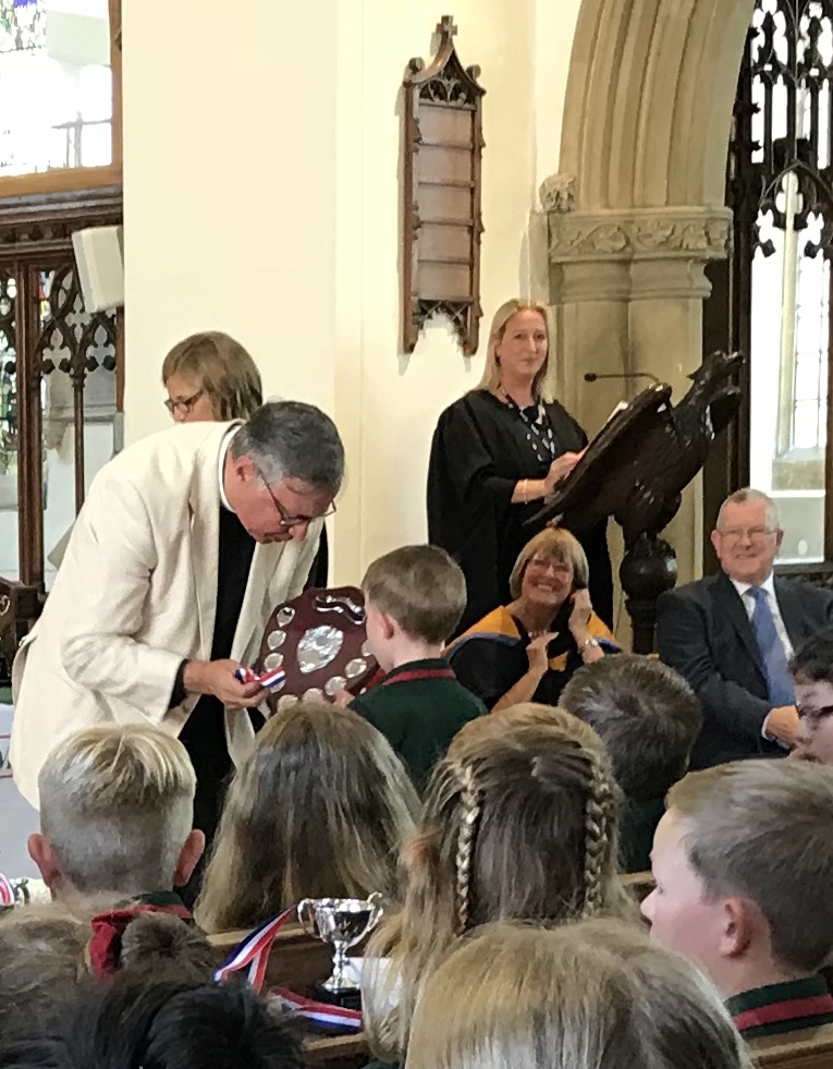 Max being awarded his swimming prize...